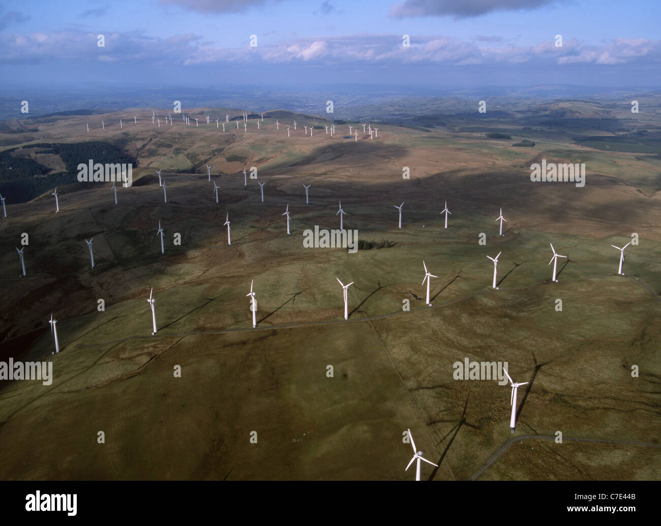 Llandinam Wind farm Turbines across hill summit near Llanidloes Powys Mid Wales UK Stock Photo