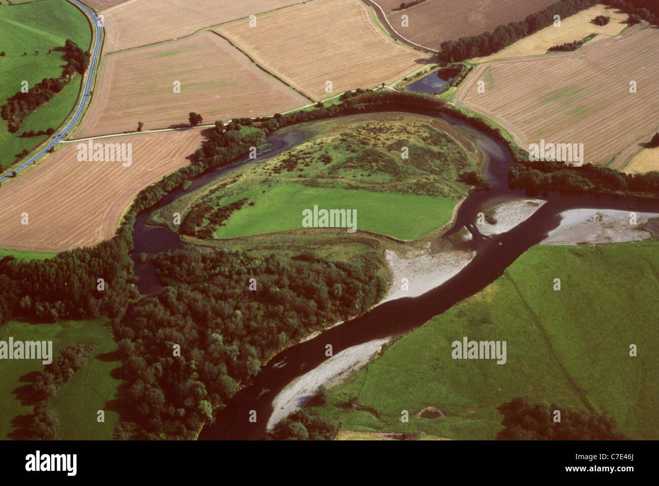 Aerial view of oxbow lake formed when river shortens course, bypassing meander Wales UK Stock Photo