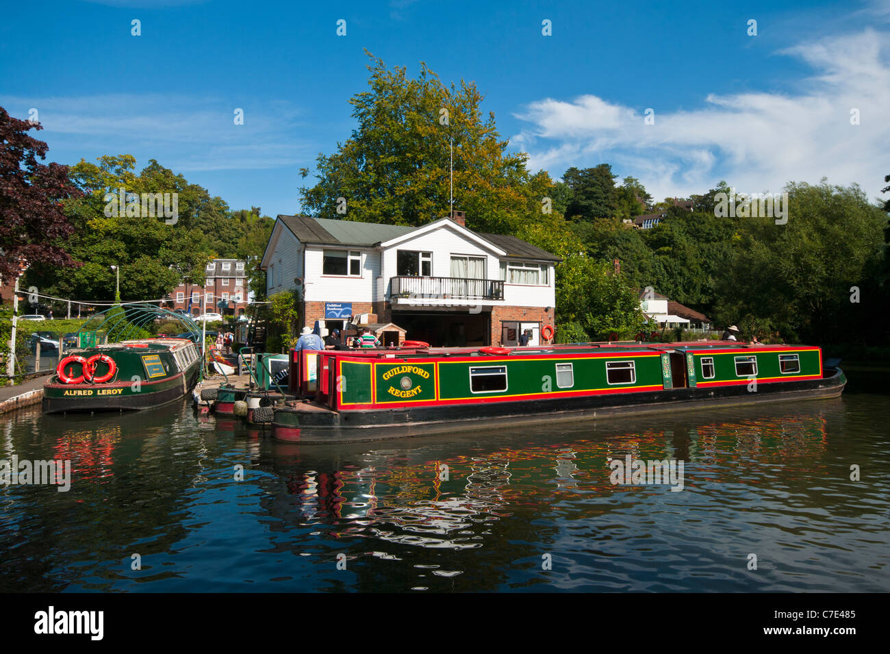 Canal Narrow Boats Narrowboats Moored By The Boathouse On The River Wey Guildford Surrey England UK Stock Photo