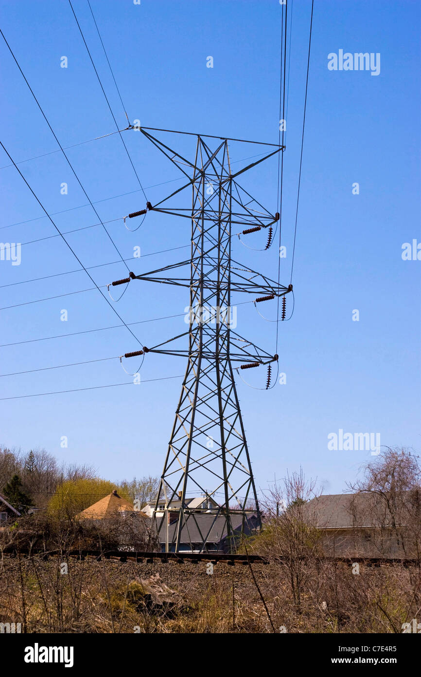 Some high power lines over a bright blue sky. Stock Photo