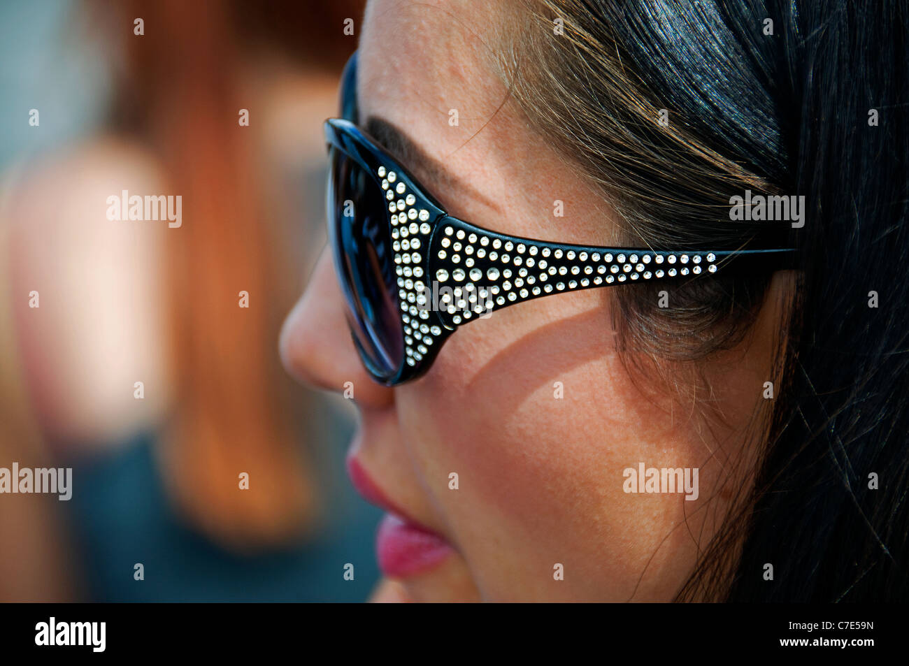 woman female wearing sunglasses rhinestones Stock Photo Alamy