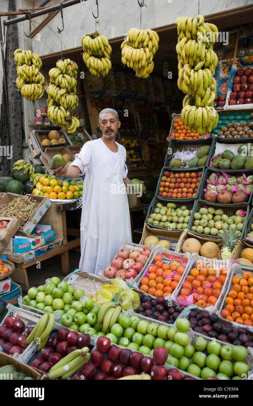 Greengrocer with his shop full of fruit and vegetables, Egypt Stock Photo