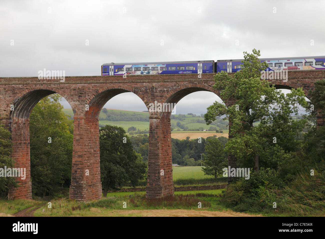Sprinter train on the Dry Beck Viaduct on the Settle to Carlisle Railway in the Eden Valley, Cumbria, England, UK Stock Photo