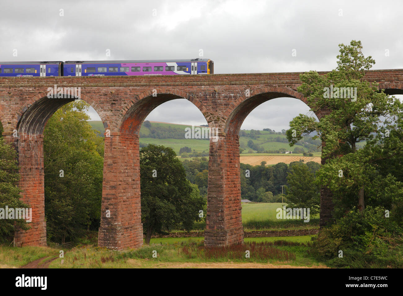 Sprinter train on the Dry Beck Viaduct on the Settle to Carlisle Railway in the Eden Valley, Cumbria, England, UK Stock Photo