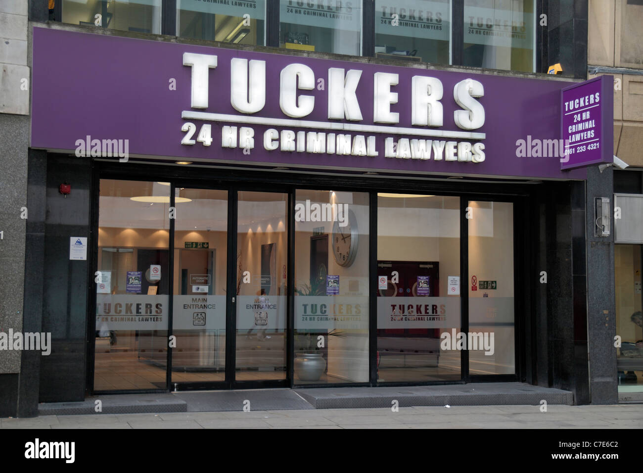 Tuckers 24hr criminal lawyers shop/offices in Manchester, UK Stock