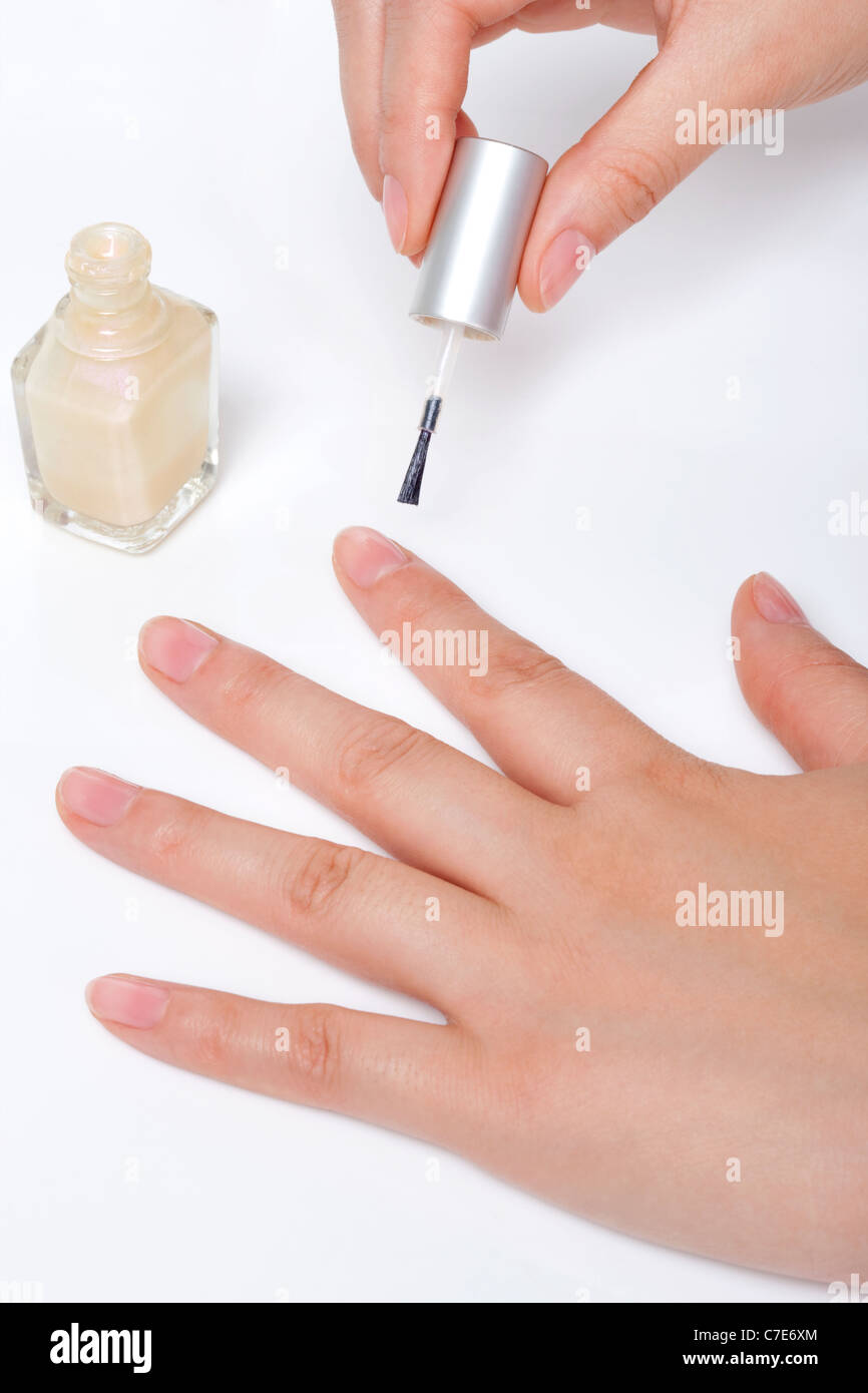 Woman Painting Fingernails Stock Photo - Alamy