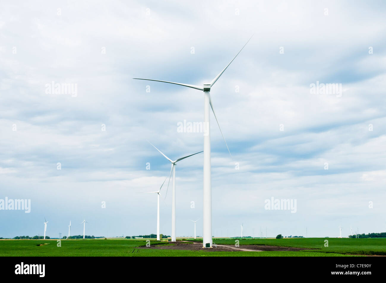 Horizontal-axis wind turbines are shown on a wind farm site near Lakefield, Minnesota. Stock Photo