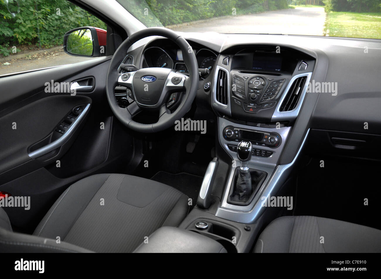 Ford Focus III 1.6 TDCi - MY 2011 - red - Popular German compact car,  segment C - interior Stock Photo - Alamy