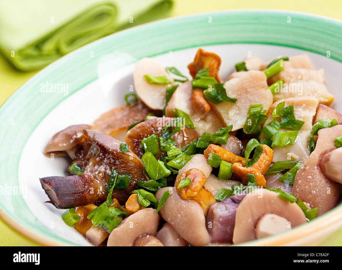 Marinated mushroom mix closeup with onion herb Stock Photo