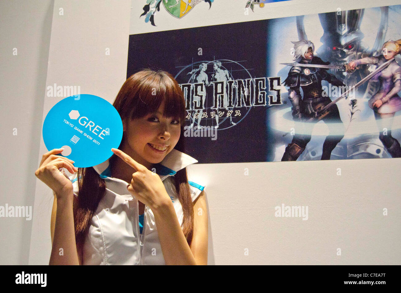Gree's campaign girl poses for pictures during the Tokyo Game Show 2011 in Makuhari. Stock Photo