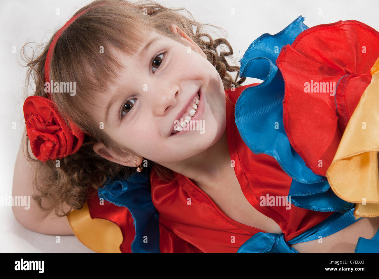 Portrait of the little girl dancer to a white background Stock Photo ...