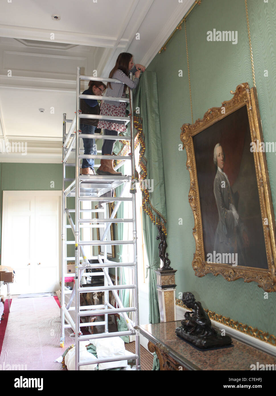 Chatsworth House in Derbyshire which is to re-open after an extensive facelift. Pictured is a workman adding finishing touches. Stock Photo