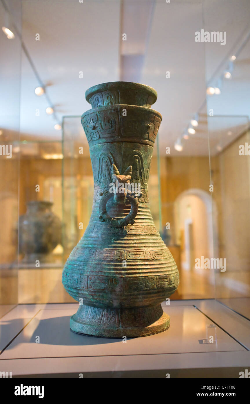 Chinese Bronze Vase within a glass display case - part of the art collection at Compton Verney, Warwickshire, UK. Stock Photo