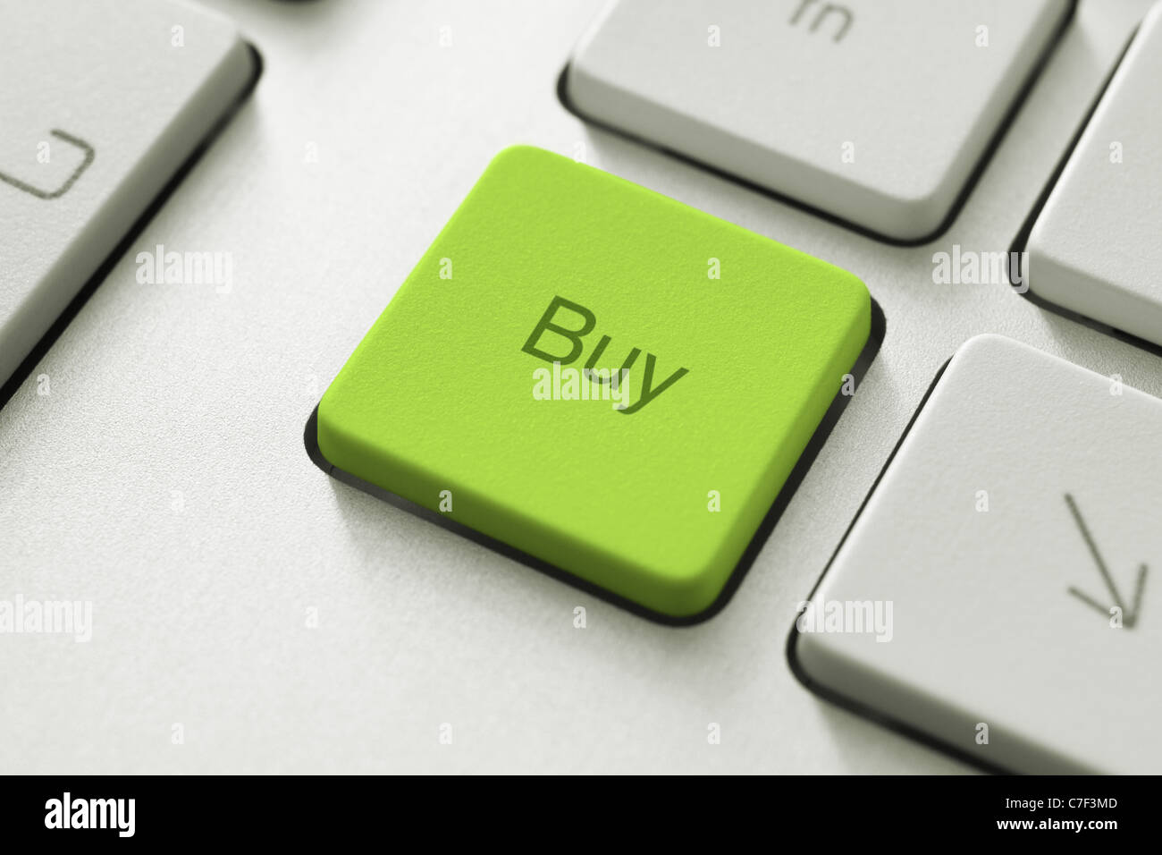 Buy button on the keyboard. Toned Image. Stock Photo