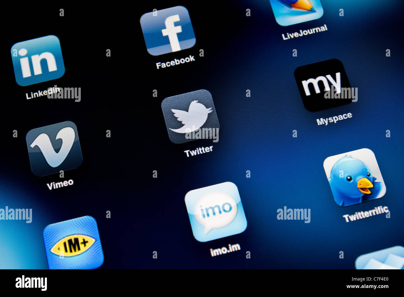 Apple iPad 2 screen showing social apps, including Facebook, Myspace, Twitter, LinkedIn, Vimeo, LiveJournal and Twitter. Stock Photo