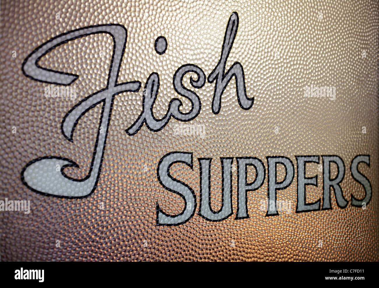 Fish Suppers sign in a fish and chip shop, Whitstable, UK. Stock Photo