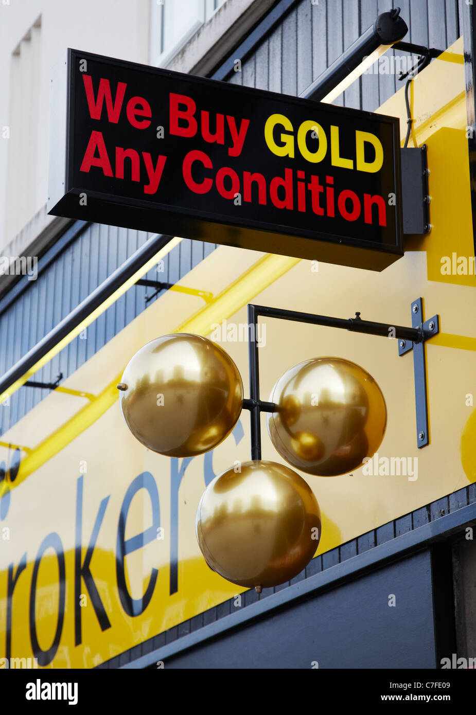 Pawnbrokers with sign offering to buy gold, Barking, London, UK. Stock Photo