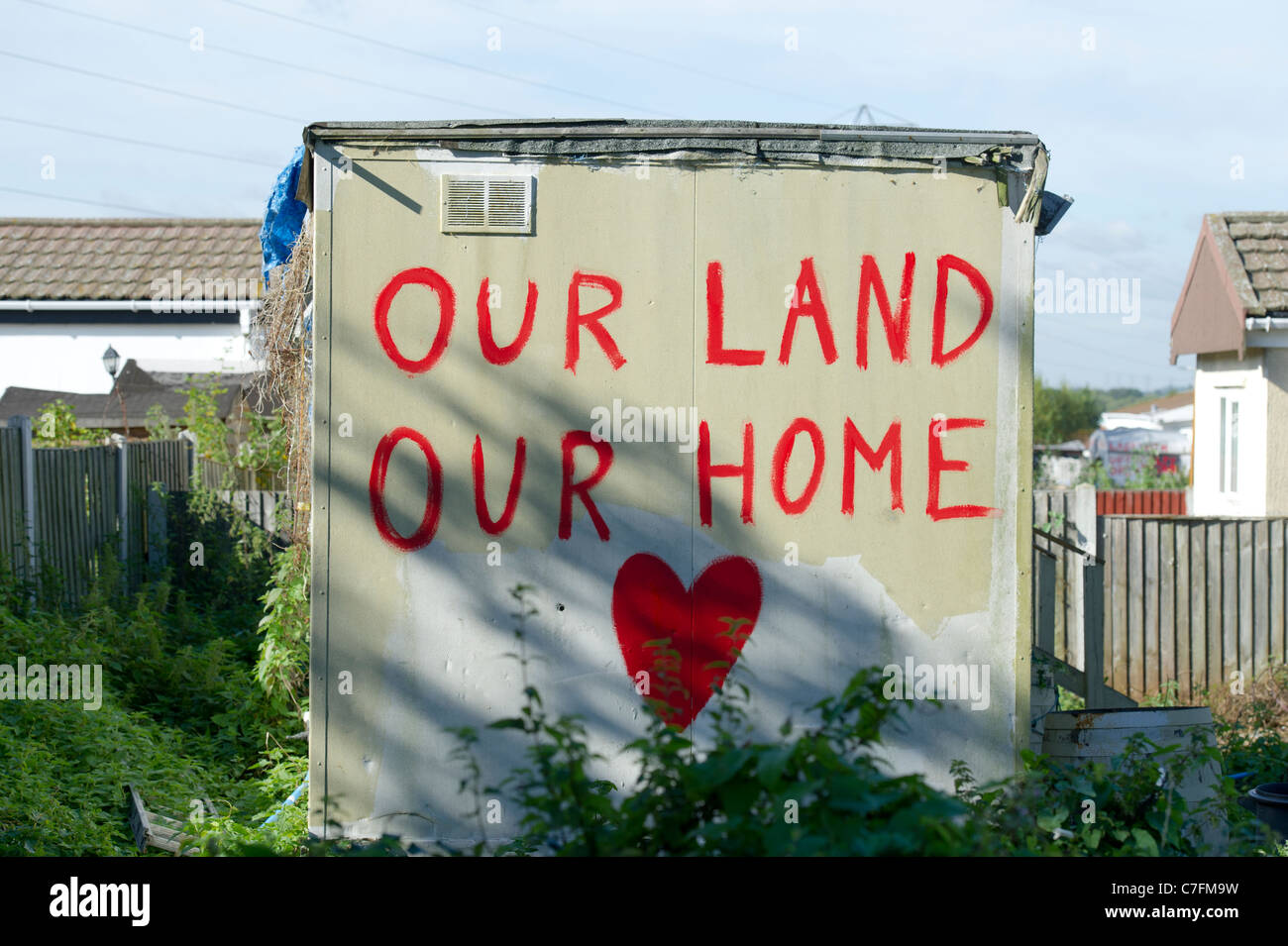 Message painted on wall of outhouse at Dale Farm, Basildon, the largest traveller site in the UK. Photo:Simon Ford Stock Photo