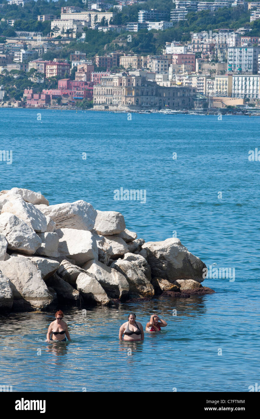 Local people swimming at Naples, Italy Stock Photo