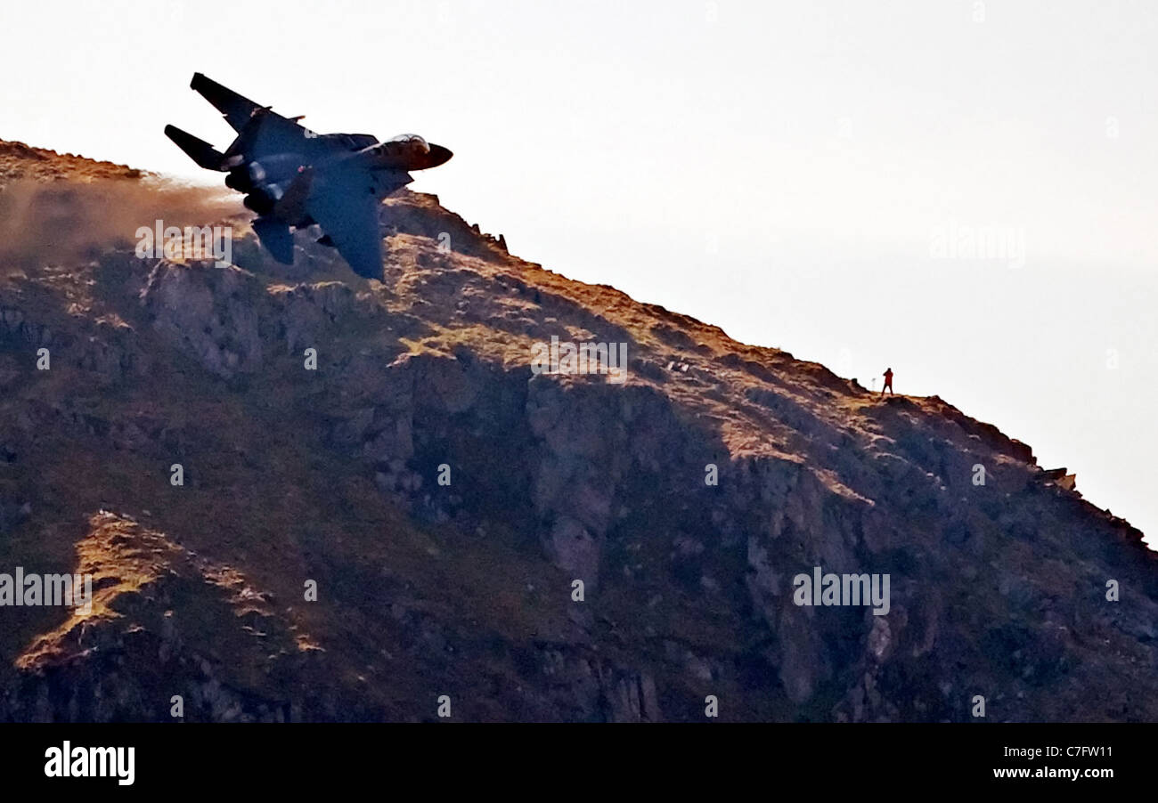 USAF F-15E Strike Eagle makes a turn during a low flying flight in mid Wales. they can go as low as 250ft Stock Photo