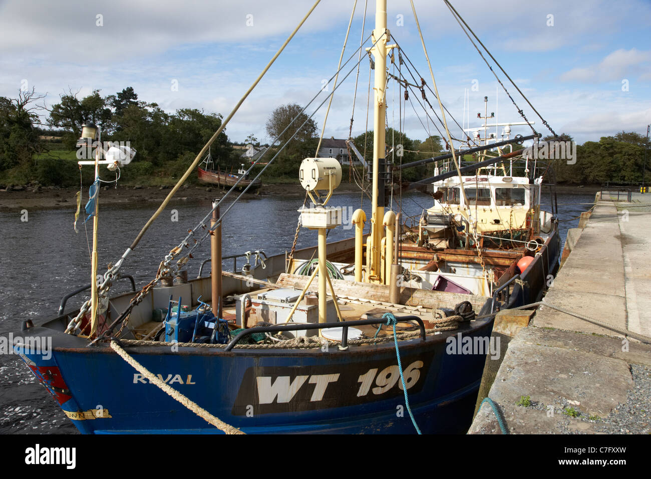 fishing boats on the quay at the river lennon ramelton county donegal republic of ireland Stock Photo