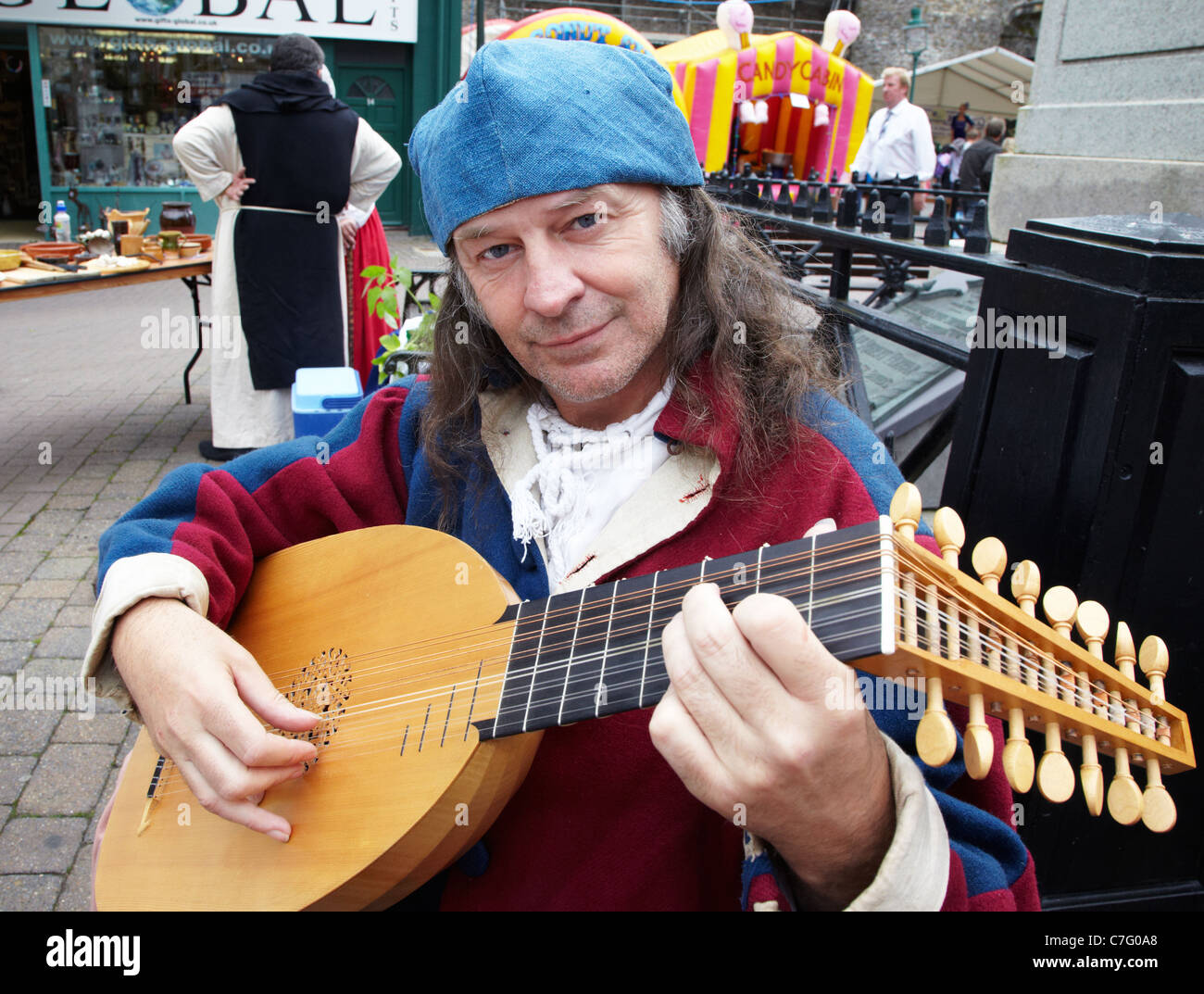 Musician Playing A Lute Merlin Festival Carmathen Pembrokeshire Wales UK Stock Photo