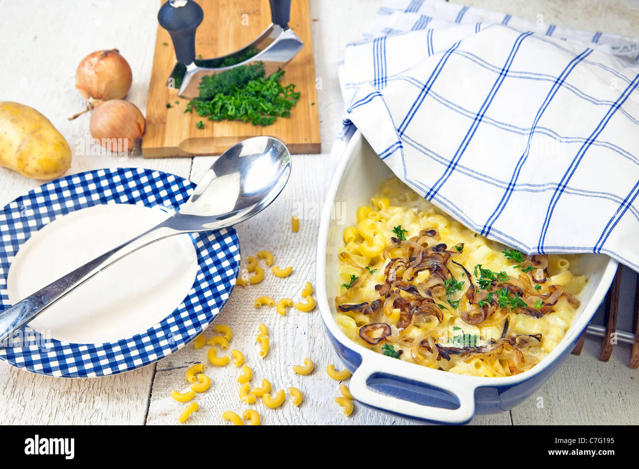 The traditional Swiss Alps dish of noodles, potatoes, onions and cheese Stock Photo