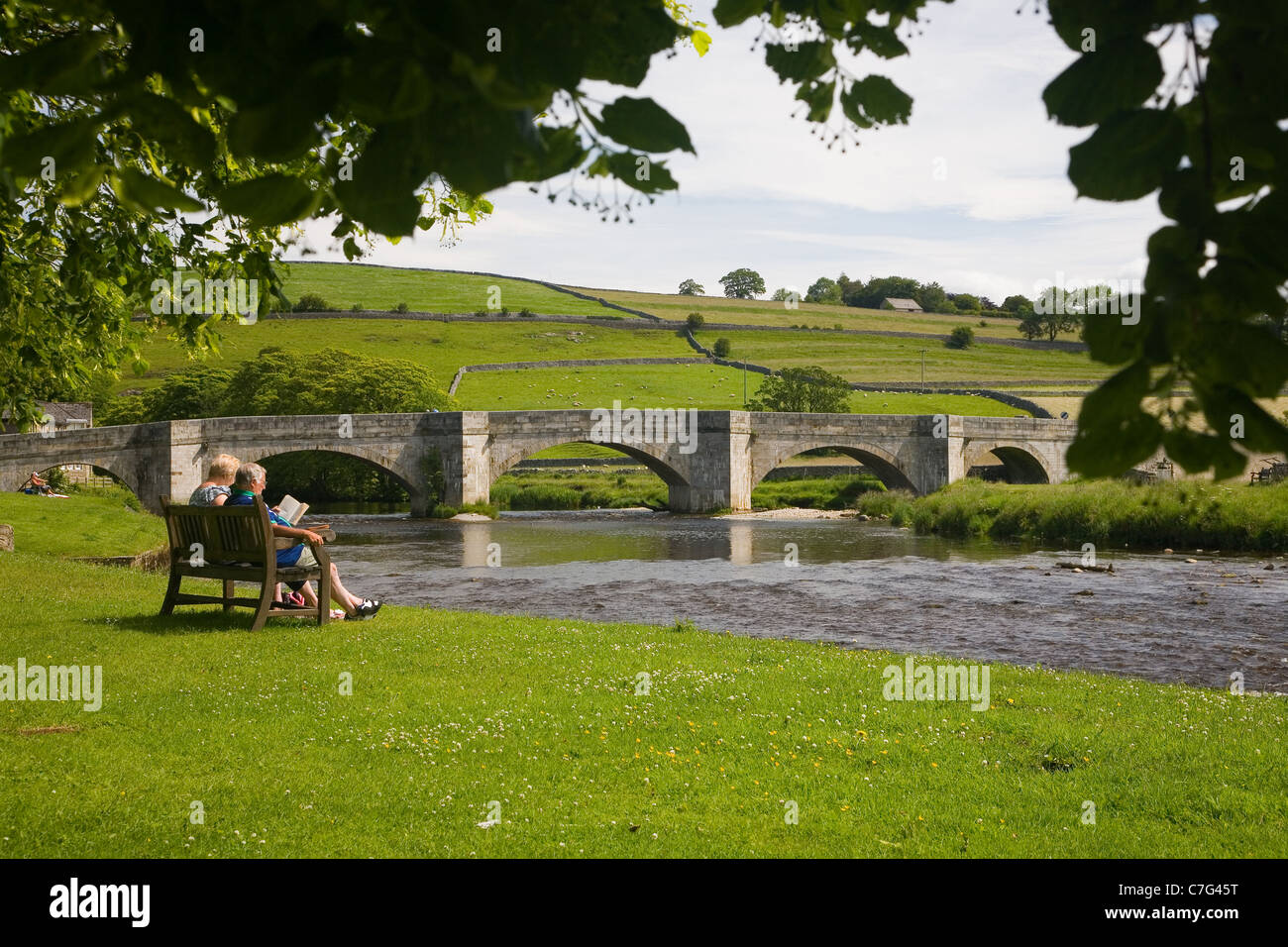 The five-arched bridge at Burnsall, Lower Wharfedale in Yorkshire and the river Wharfe. Stock Photo
