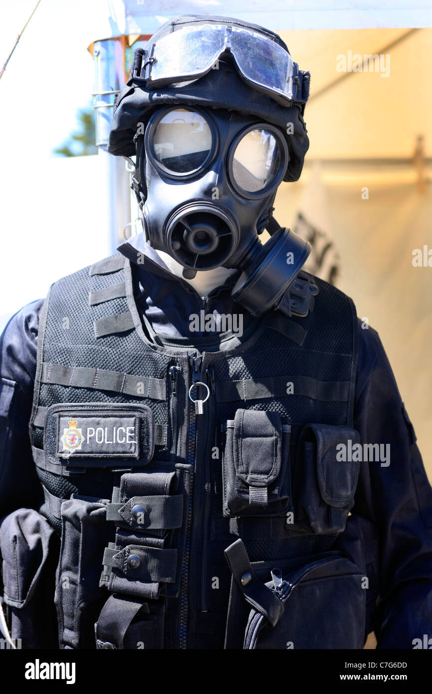 Modern British Police Riot gear making an officer look something like Darth Vader Stock Photo