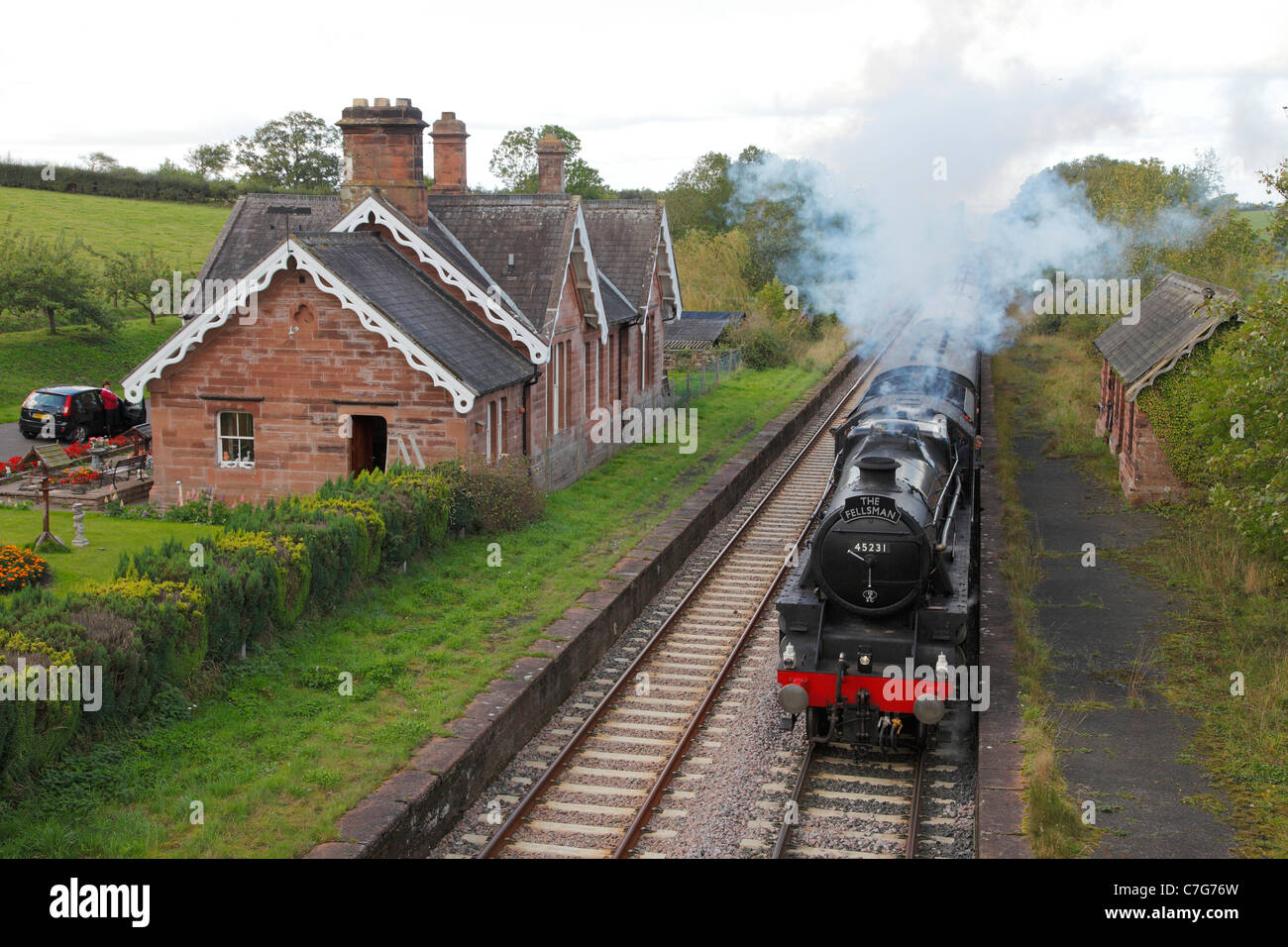 Fellsman Steam Train Passing Old Cumwinton Station On The Settle To fellsman-steam-train-passing-old-cumwinton-station-on-the-settle-to