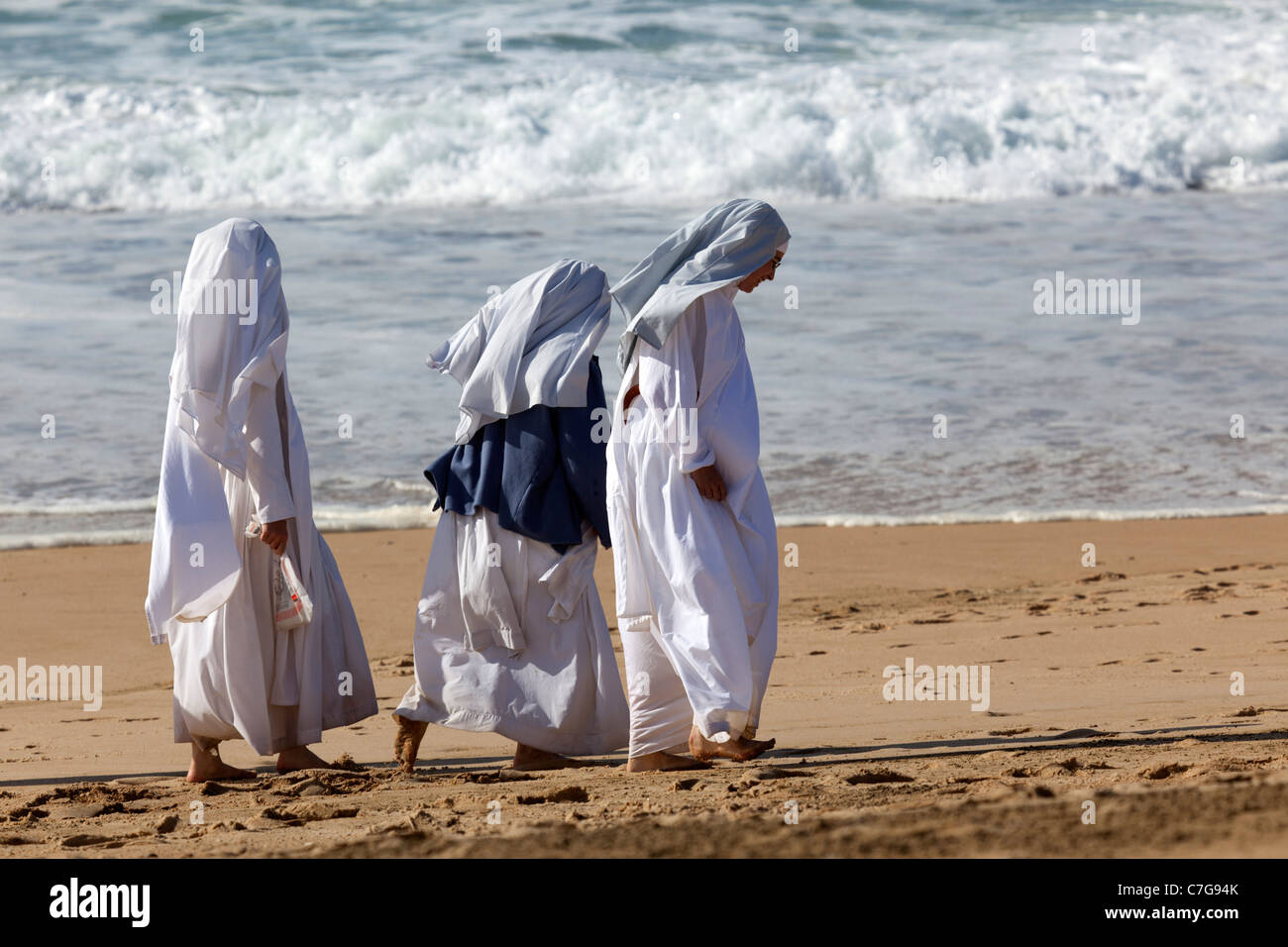 Nuns at the beach (Hossegor - France). Religieuses novices à la plage (Hossegor - France). Stock Photo