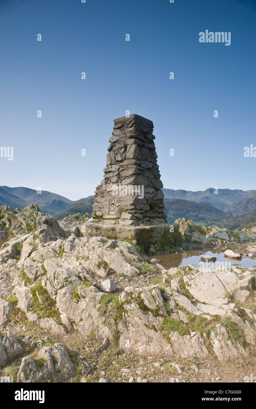 Trig point on top of Loughrigg Fell, Lake District Stock Photo