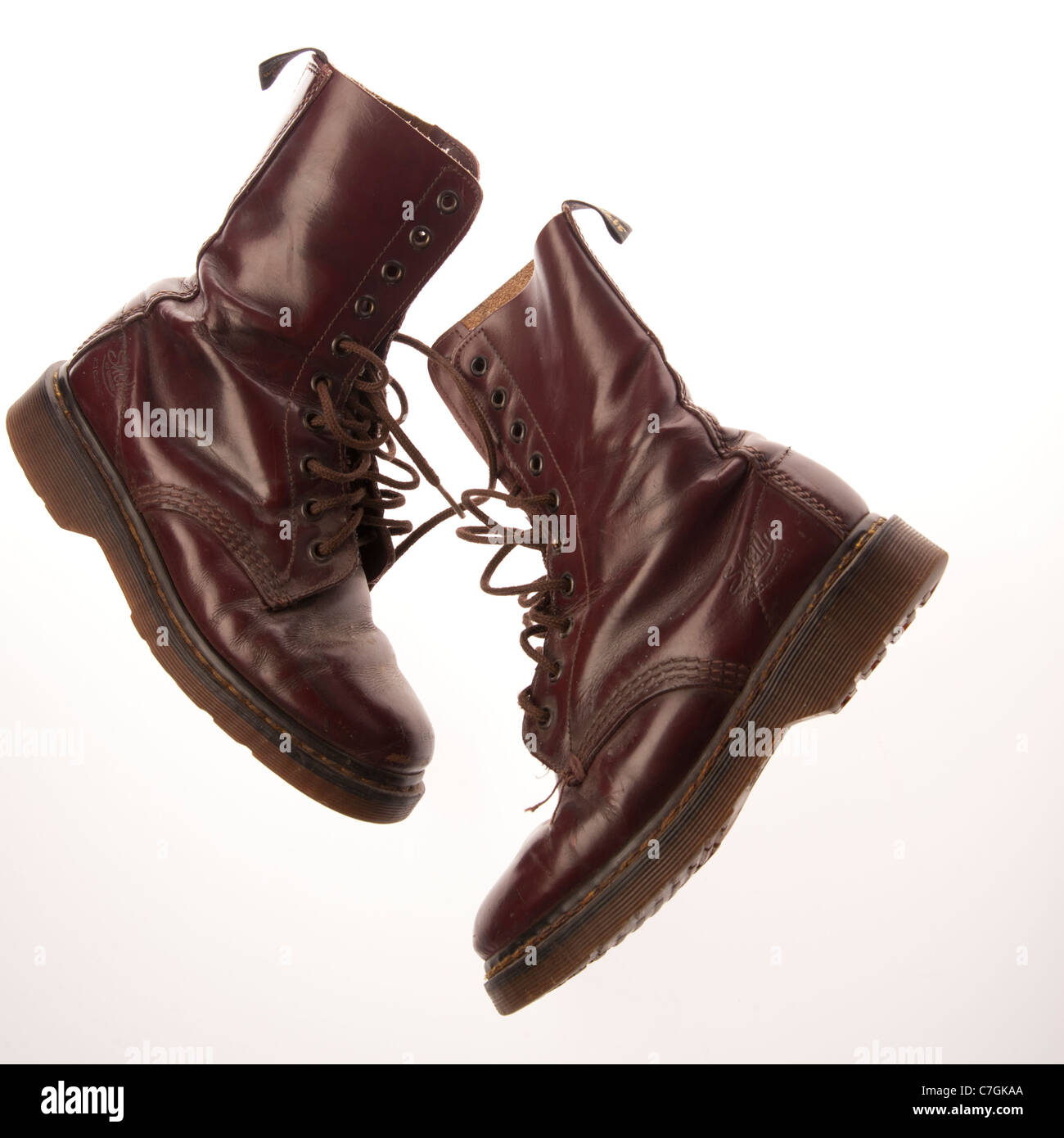 a pair of classic cherry red 10 eyelet DM Doc Martens Shelly AirWair  women's leather boots Stock Photo - Alamy
