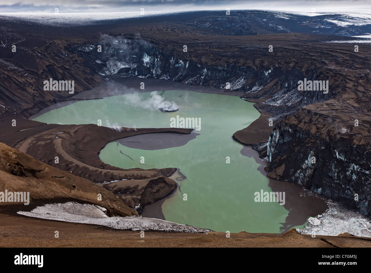 Grimsvotn crater steaming in lake, Grimsvotn volcanic eruption, Iceland Stock Photo
