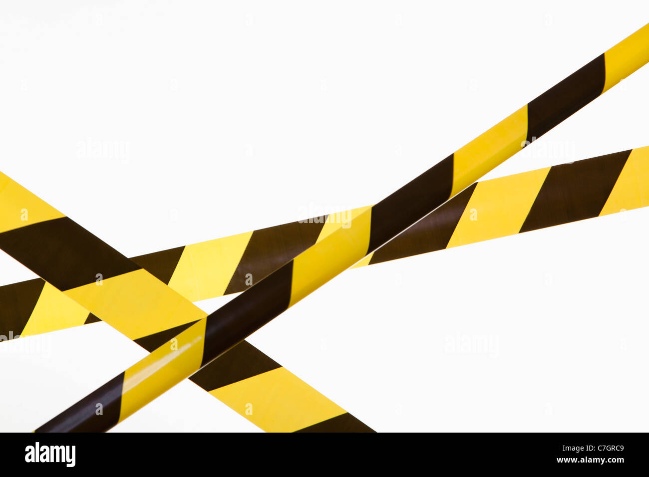 Crisscrossed yellow and black striped cordon tape Stock Photo Alamy