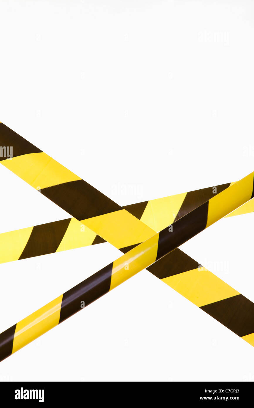 Crisscrossed yellow and black striped cordon tape Stock Photo Alamy