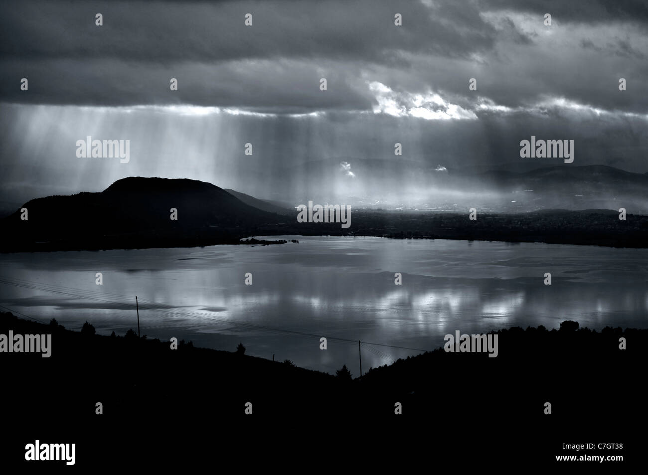 Storm coming in Pamvotis (or "Pamvotida") lake, Ioannina, Epirus, Greece (B&w version) Stock Photo