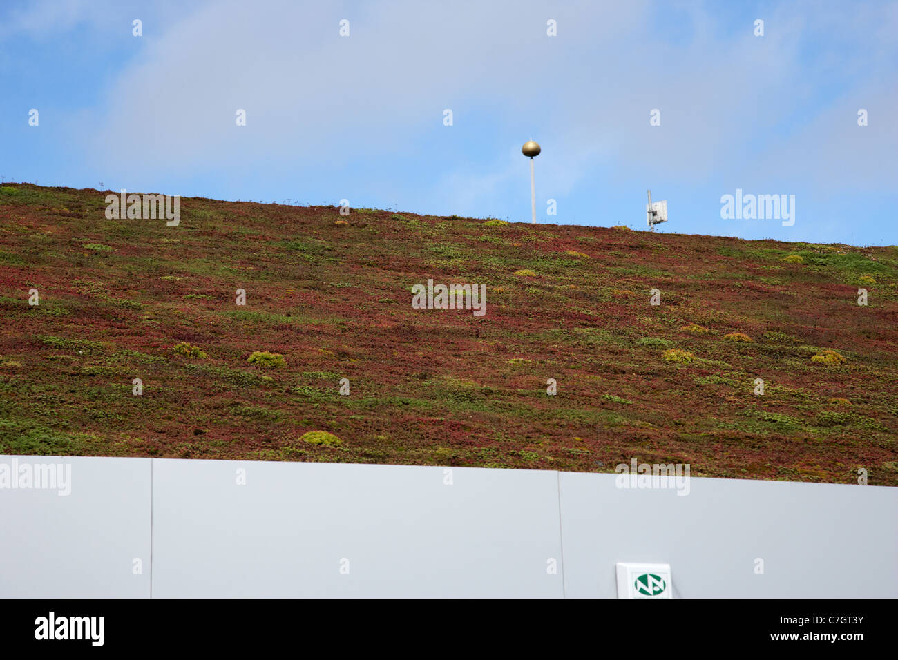 sloping sedum grass roof on a public services building in letterkenny county donegal republic of ireland Stock Photo