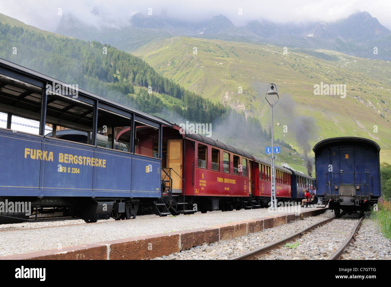 Furka cogwheel railway steam train at the Realp station. Switzerland