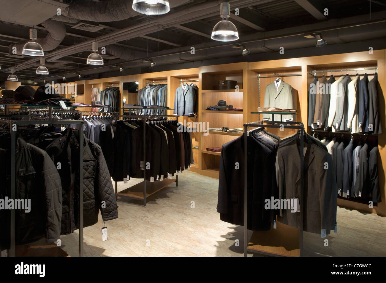 Racks of clothes in a menswear store Stock Photo - Alamy