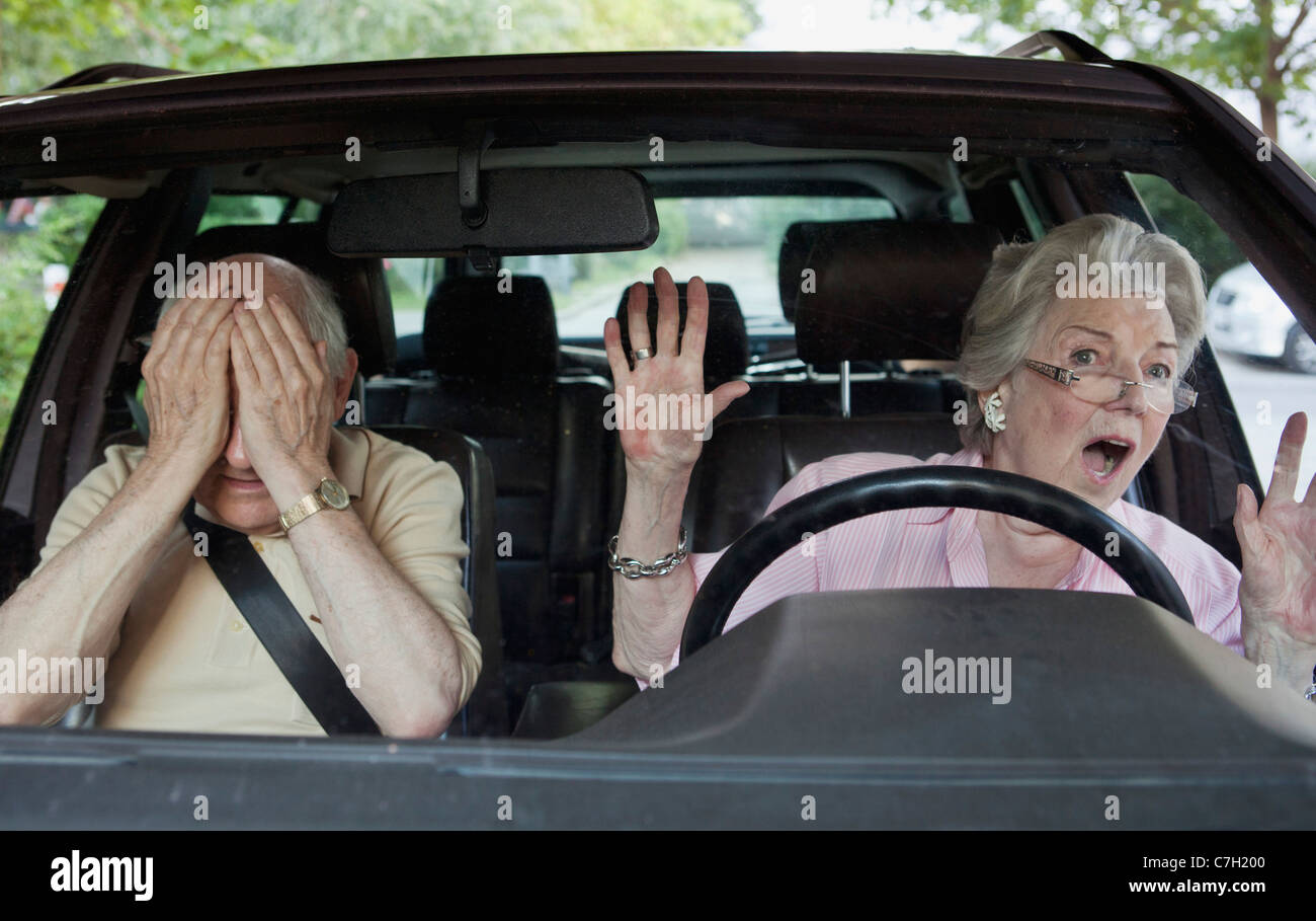 Senior woman having trouble learning to drive Stock Photo