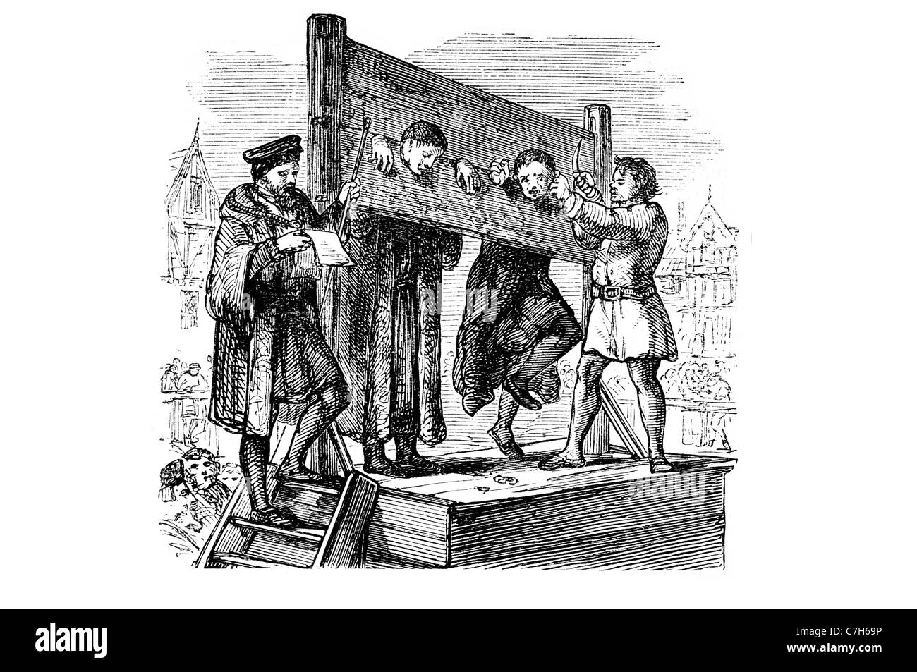 pillory medieval physical punishment public humiliation victim market scorn offender criminal corporal crime law   ridicule Stock Photo