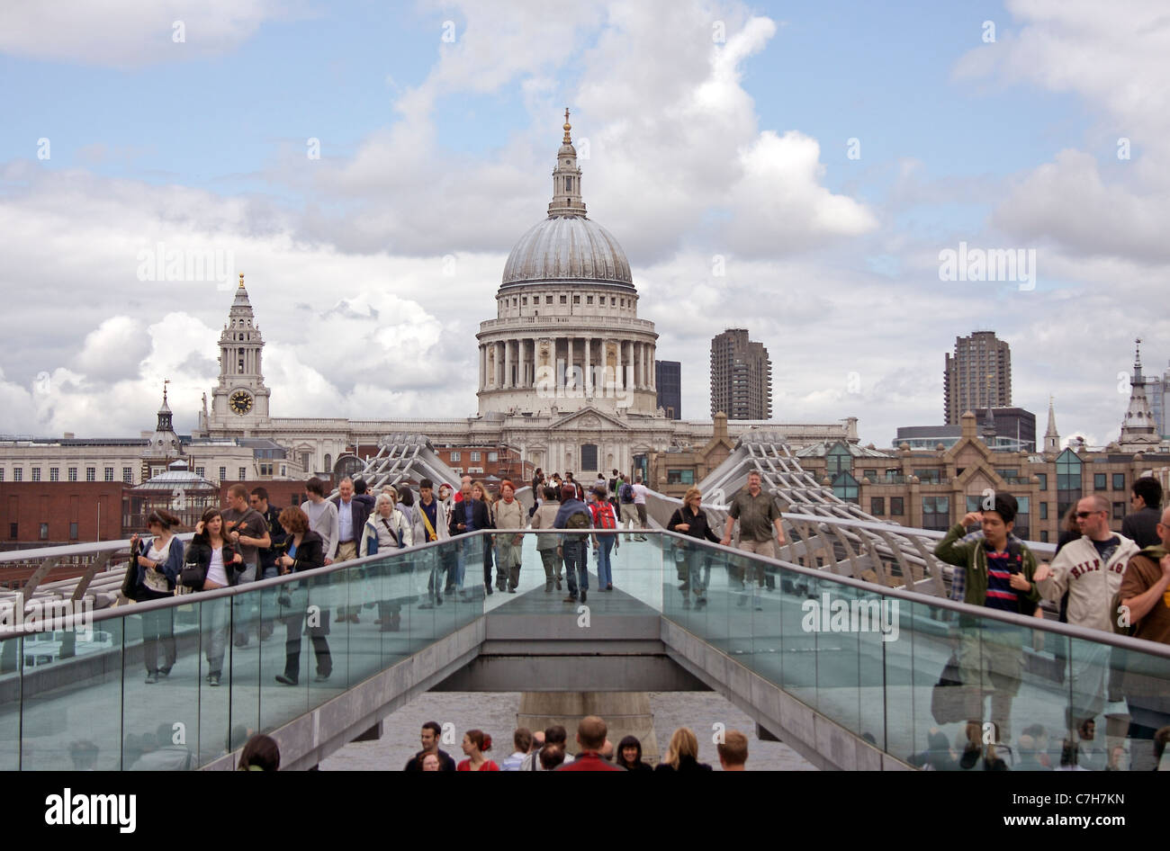 The London Millennium Footbridge crossing from Bankside towards St Paul's Cathedral in London, England Stock Photo