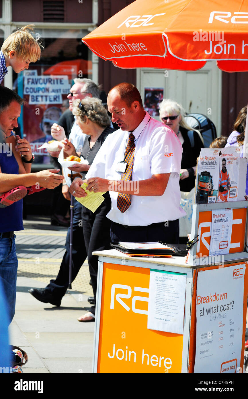 RAC saleman making a sale in Whitby, England Stock Photo