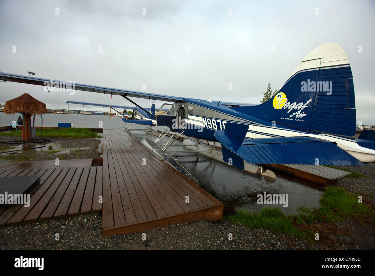 Float plane sits by a dock at Lake Hood, Anchorage, Alaska, United ...