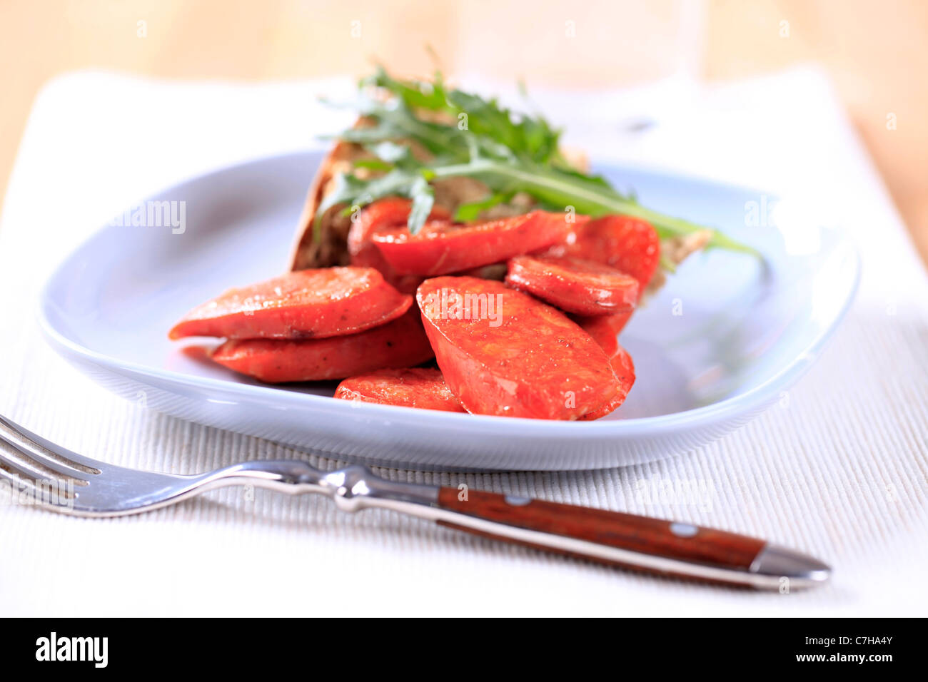 Slices of Italian sausage with red pepper flavor Stock Photo
