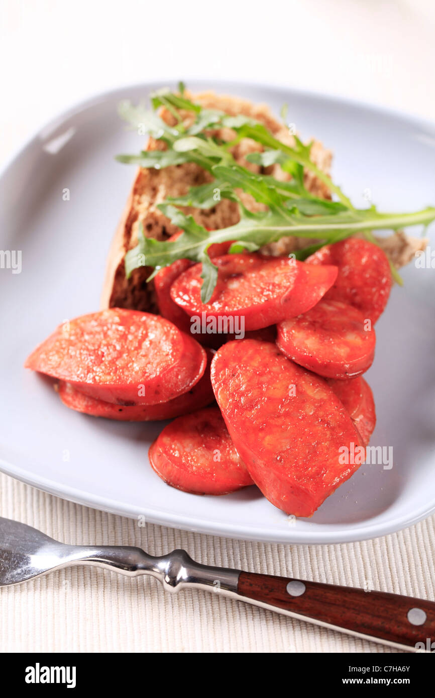Slices of Italian sausage with red pepper flavor Stock Photo