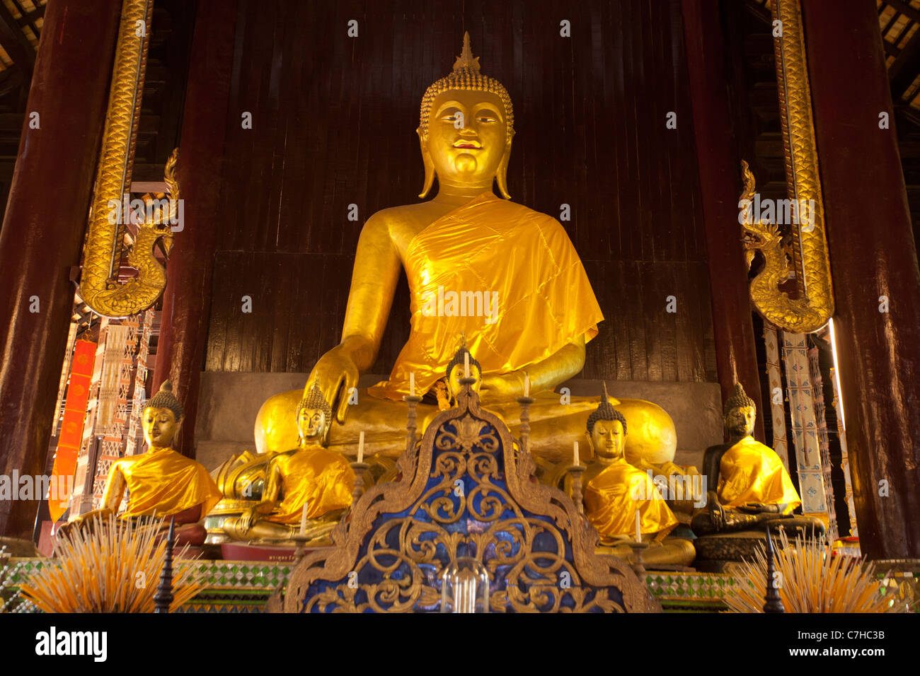 golden buddha statue in chiang mai temple, thailand Stock Photo - Alamy
