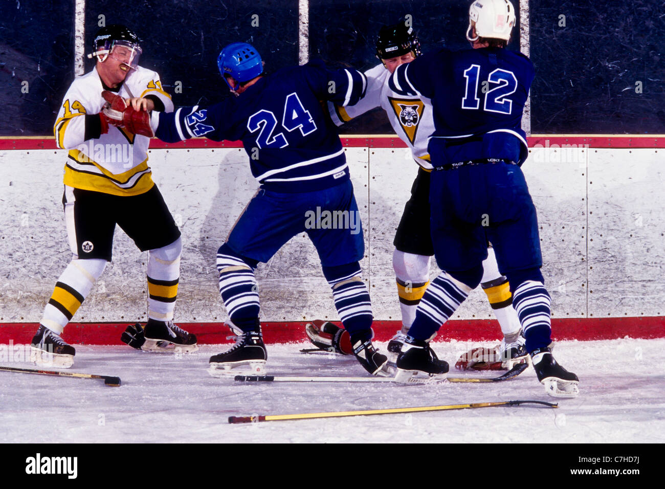 Ice hockey players fighting during a game Stock Photo Alamy