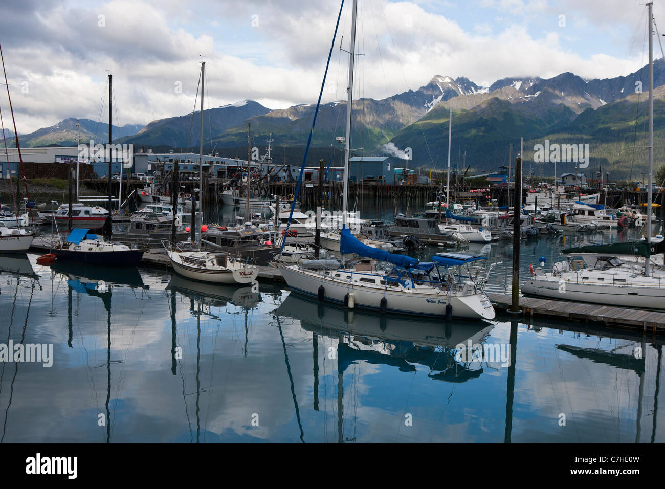 Sailboats in a marina with mountains in the background, Seward, Alaska, United States of America Stock Photo